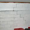 A buckling foundation wall in a White home.