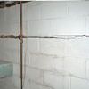 Severe foundation damage from a long crack in a bucking wall of a West Mifflin home.
