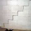 A diagonal stair step crack along the foundation wall of a Fairmont home