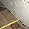 Foundation wall separating from the floor in Greensburg home
