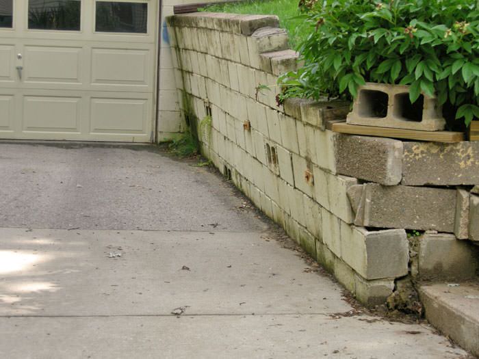 a failing retaining wall around a driveway in Pittsburgh