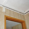 The ceiling and wall separating as the wall sinks with the slab floor in a Fairmont home