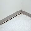 A partition wall separating from the floor in a Saint Clairsville home.