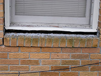 A window sill cracking and separating from the foundation wall in a Clarksburg home.