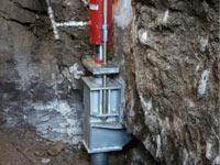 Foundation repair contractors lifting a structure in Cranberry Township.