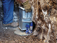 Securing a foundation footing bracket for a foundation repair system in Wexford.