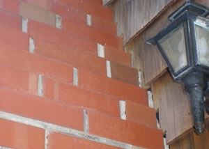 a repaired chimney in Weirton that had shown serious foundation damage and was repaired with a helical pier system.