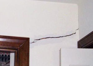 A large drywall crack in an interior wall in Monroeville