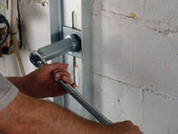 Mounting a foundation wall channel anchor in Wheeling.