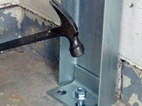 Mounting a foundation channel anchor installation to the floor in Wheeling.