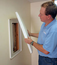 wall anchor covers installed in a foundation repair for a Saint Clairsville home.