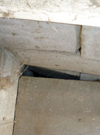 inward rotation of a foundation wall damaged by street creep in a garage in Glenshaw