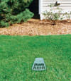 A buried gutter drain downspout extension installed in a Washington home